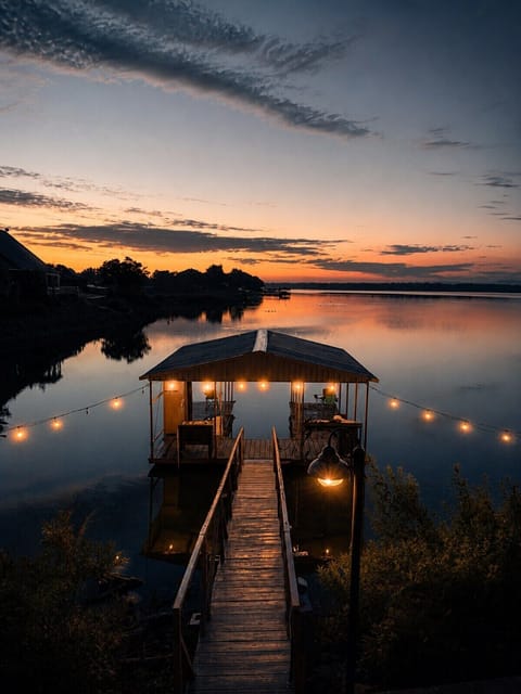 Start your morning with coffee, peaceful lake views from a private deck & dock.