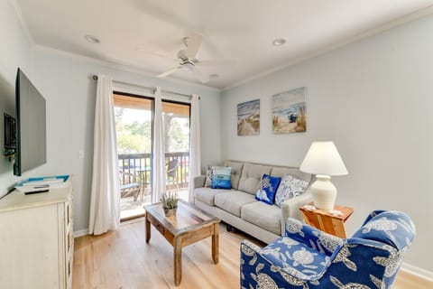 Beautiful and comfortable living room with 55” Smart TV. 