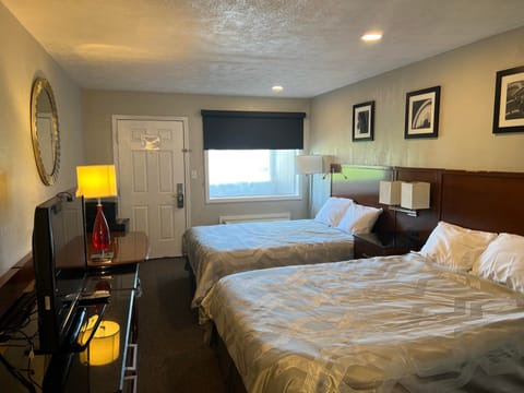 Pillowtop beds, blackout drapes, iron/ironing board, free WiFi