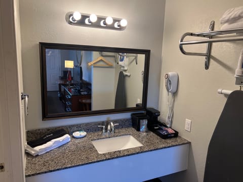 Combined shower/tub, hair dryer, towels, soap