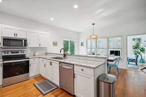Open concept kitchen and dining space.