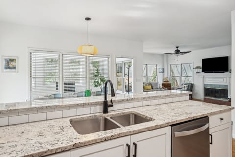 Additional view of the open concept kitchen, dining and entertaining space.