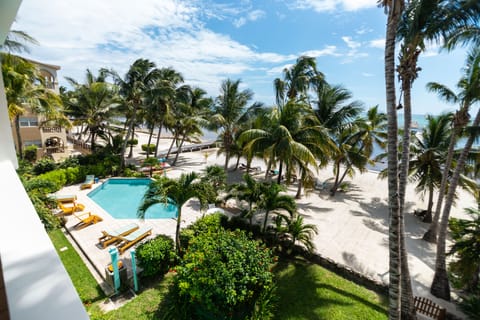 View of pool and beach from balcony