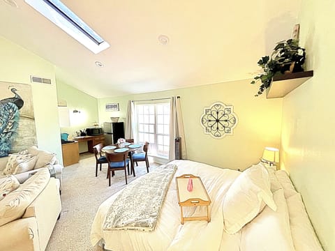 Vaulted ceilings with a skylight add to the charm and roominess. 