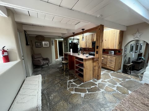 Passthrough with traditional Adobe kitchen 