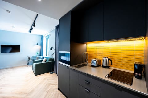 Studio Apartment (3 Adults) | In-room safe, iron/ironing board, free cribs/infant beds, free WiFi