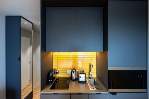 Studio Apartment (2 Adults) | In-room safe, iron/ironing board, free cribs/infant beds, free WiFi