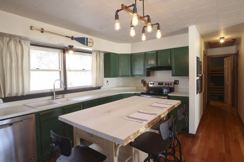 Full size kitchen with dishwasher, lots of counter space.