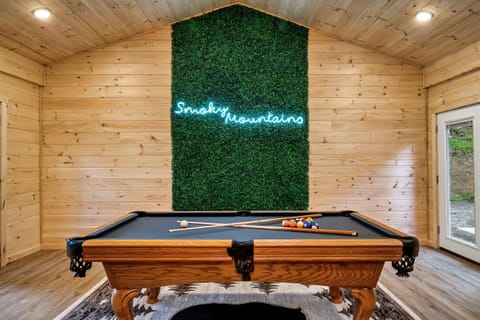 Luxury game room with incredible custom touches throughout the entire cabin!