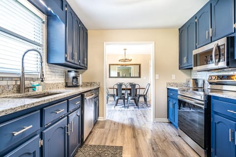 Kitchen overlooking dining room.