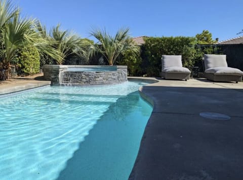 Rejuvenating jacuzzi with plush lounge chairs