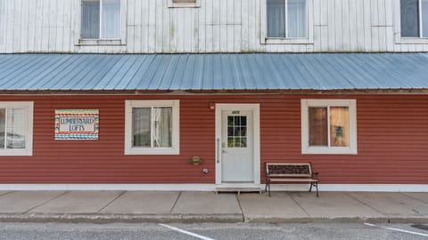 The building's main door leads to Dewdrop Condo.