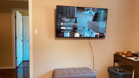 Master bedroom 55 inch wall mounted TV w streaming services set up and ready