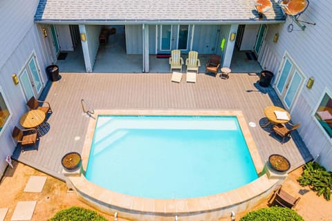 Relaxing Community Pool with Lounge Seating