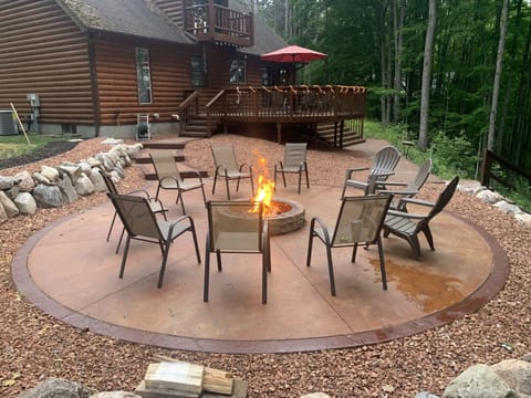 Outdoor firepit patio overlooking the Betsie River