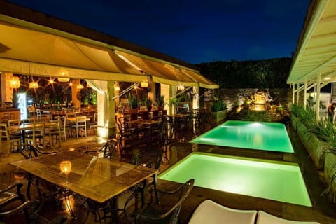 Outdoor pool, open 8:00 AM to 10:00 PM, sun loungers