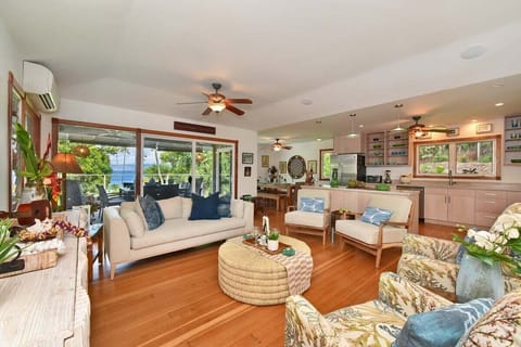 Luxurious beachside getaway with stylish furnishings and breathtaking ocean vista.