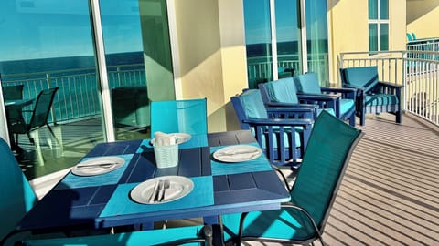 Our HUGE Balcony has Outdoor Dining & Oversized Lounge Chairs