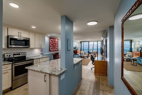 Fully stocked designer kitchen for preparing family meals.