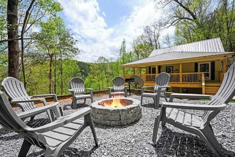 Evenings made perfect—gather ‘round the fire at your private cabin retreat.