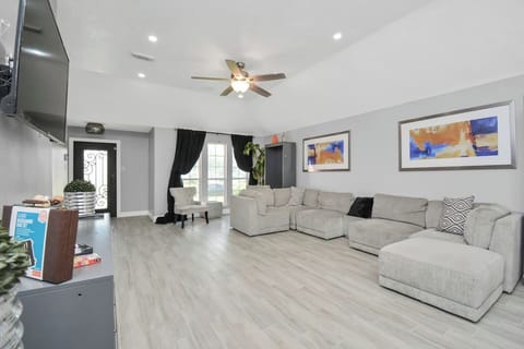Our inviting living room is the heart of the home—perfect for relaxing, sharing conversations, or enjoying a movie night after a busy day in the city.