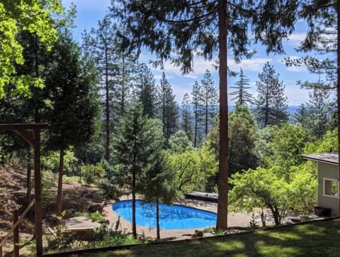 In-ground pool with a view of the Sierra Nevada mountains.
