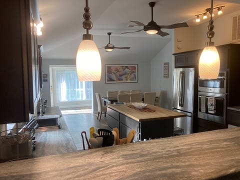 Another view of kitchen from the kitchen counter towards the front of house
