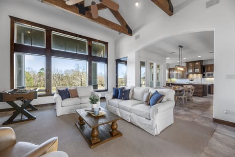 Luxury House | Living area | 32-inch Smart TV with digital channels, TV, books