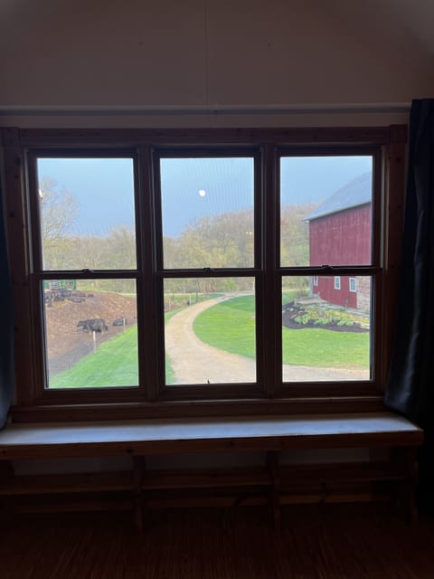 Picture window overlooks the farm.