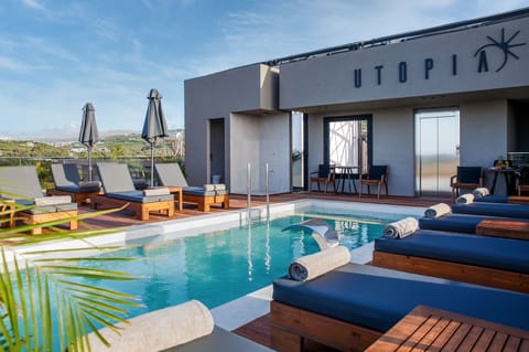 Seasonal outdoor pool, pool umbrellas, sun loungers