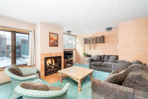 Cosy living area with a fireplace to keep you warm.