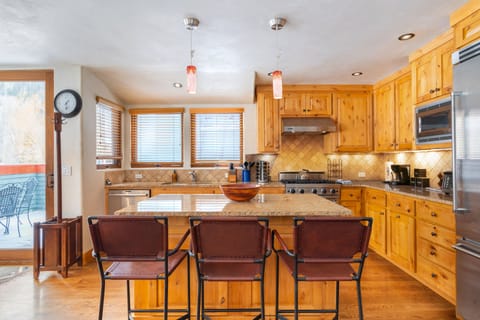 Barstool seating in the kitchen.