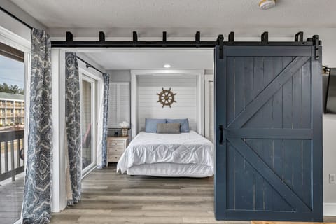 Queen bed, sliding barn doors for privacy from living room