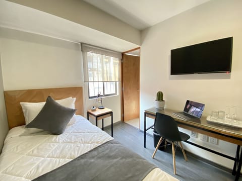 Comfort Room, 1 Twin Bed | Desk, laptop workspace, iron/ironing board, free WiFi