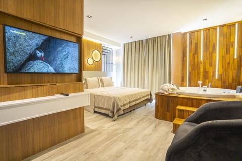 Elegance Deluxe with Jacuzzi | Premium bedding, minibar, in-room safe, iron/ironing board