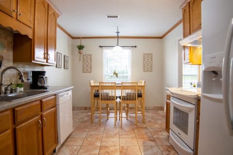 The fully furnished kitchen provides a great place to prepare some family meals