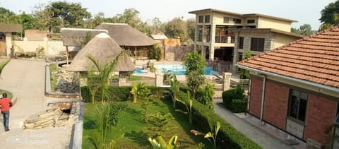 Outdoor pool, pool umbrellas, lifeguards on site
