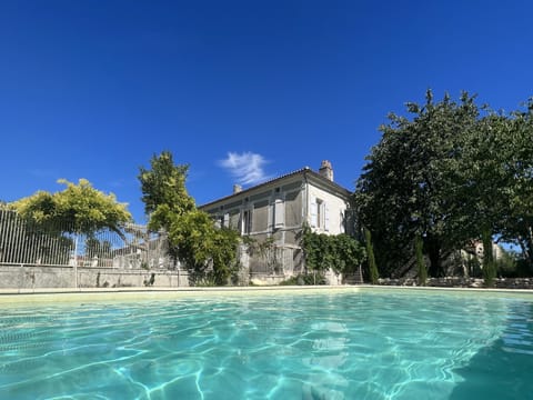 Seasonal outdoor pool, open 9:00 AM to 9:00 PM, pool umbrellas