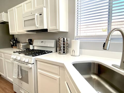 Stocked kitchen with all your basic culinary needs.