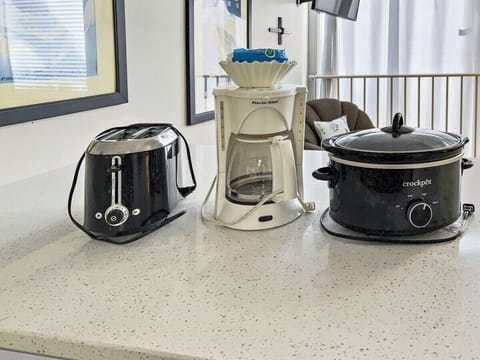 Remodeled kitchen is fully-equipped with pots, pans, & utensils.