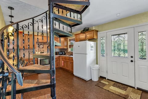 Who doesn't love a cool spiral staircase that leads to the upstairs. 