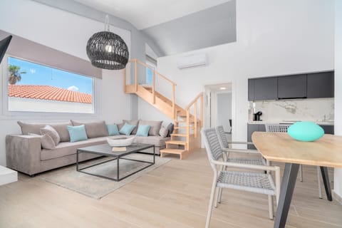 Boutique Apartment AZUL | Living area | Fireplace