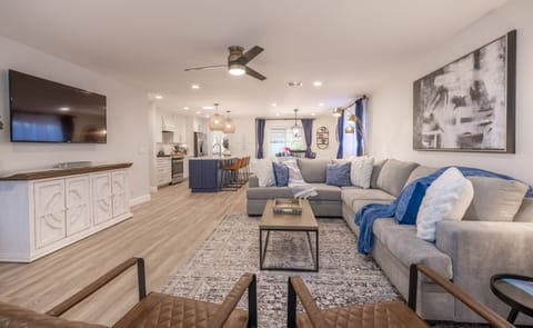 Open Great Room, Large TV, Comfy Sectional.