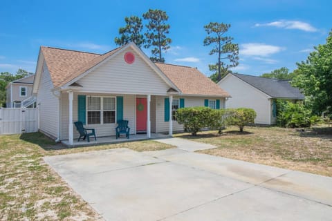 View of cottage located in the tranquil wooded section of Oak Island