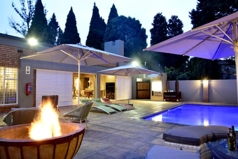 Outdoor pool, pool umbrellas, sun loungers