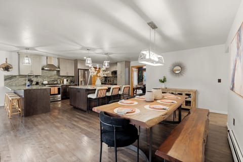Gourmet chef-style kitchen with island, barstools, and seating for 15 guests. 