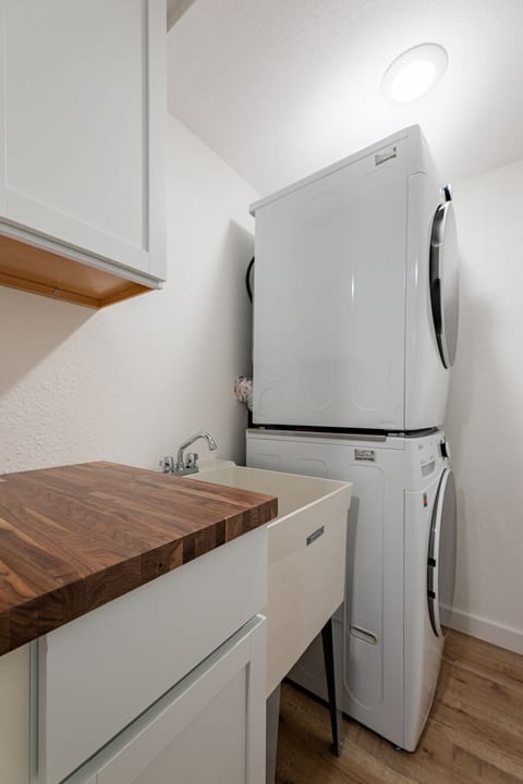 In-unit washer & dryer tucked beside the kitchen for easy, convenient laundry days.