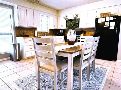 Large open kitchen dishwasher refrigerator oven and microwave