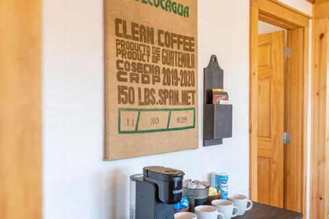 Start your day right at our cozy coffee corner, complete with a Keurig and all the essentials to brew your perfect cup.