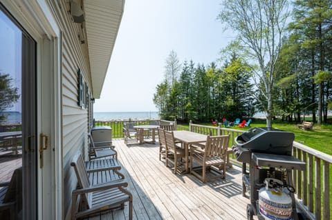 Use the grill, enjoy a meal outside or read a book while taking in the view of Lake MI from the deck
